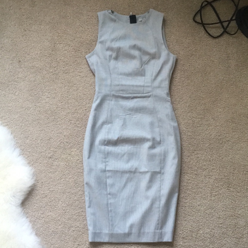 Business style mid length dress.